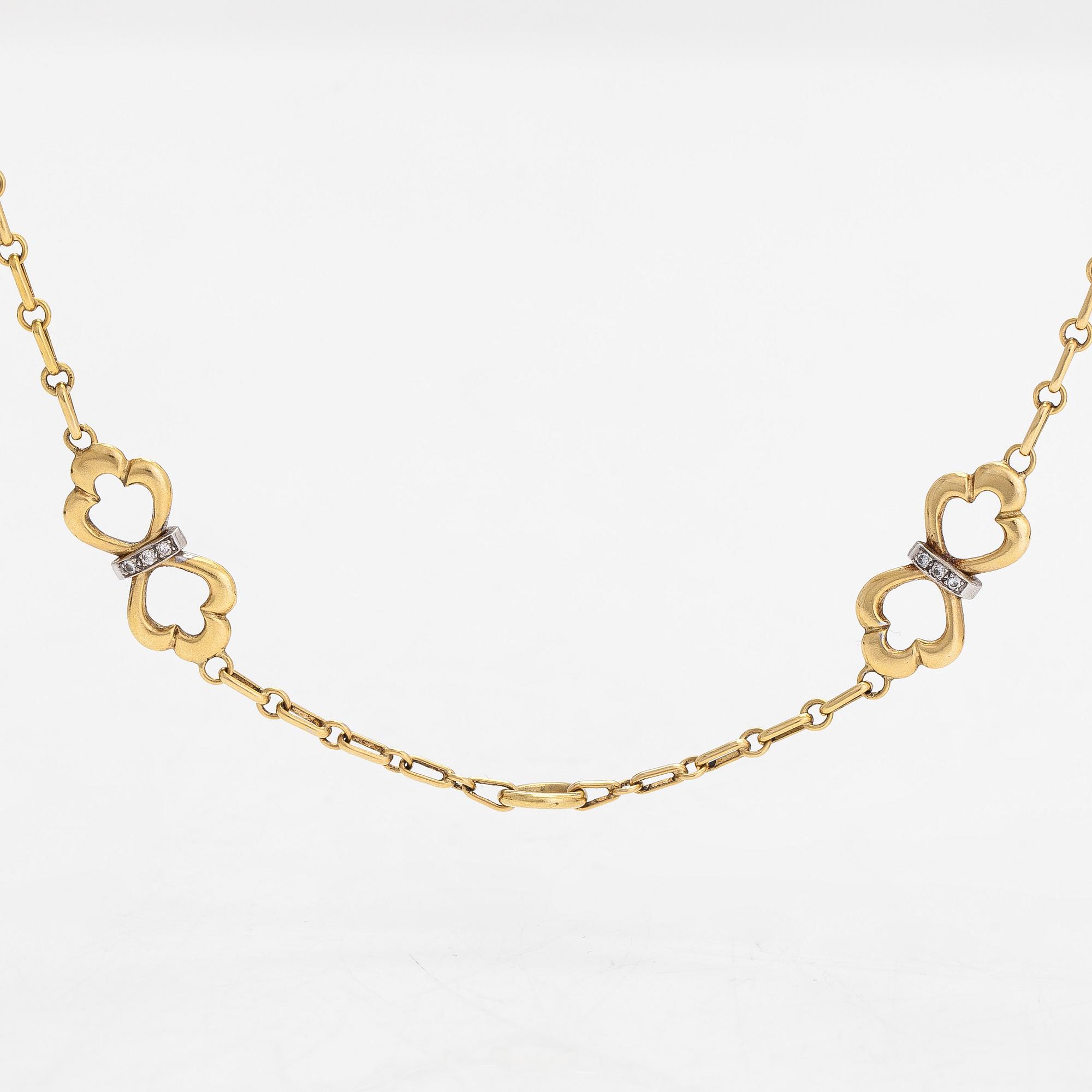An 18K gold necklace, with diamonds totalling approx. 0.12 ct. Foreign hallmarks.