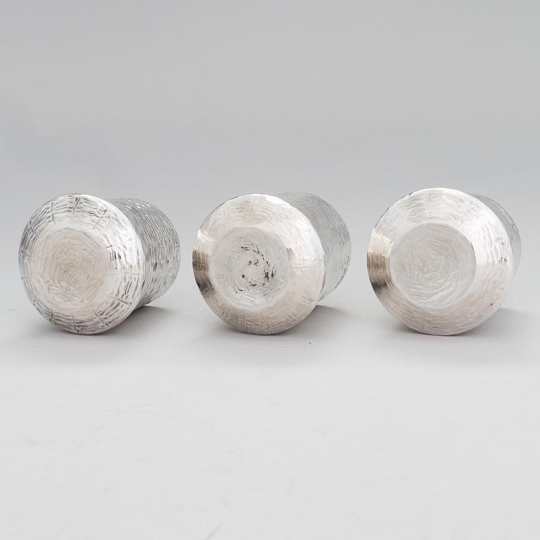 TAPIO WIRKKALA, A set of three silver beakers, marked TW, Kultakeskus, Hämeenlinna, Finland 1976.