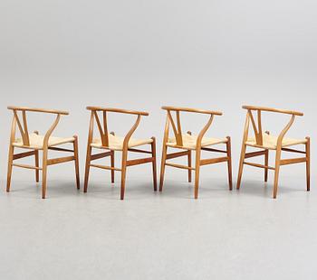 A set of four + two armchairs 'Y-chair' by Hans J Wegner, Carl Hansen & Son, Denmark.