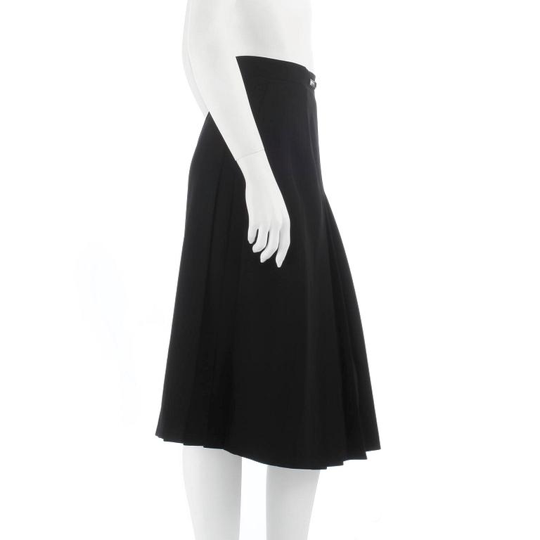 CÉLINE, a green wool skirt. Size 42.
