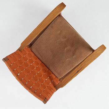 Axel Einar Hjorth, a stained pine "Väddö" easy chair, Nordiska Kompaniet, Sweden, 1930s-40s.
