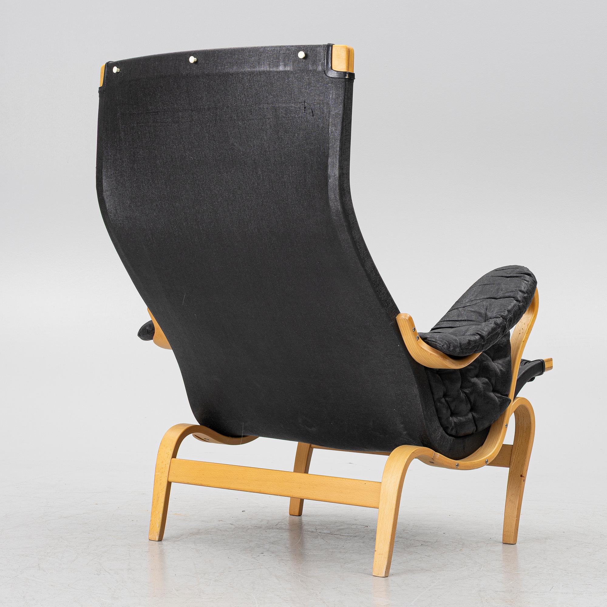Bruno Mathsson, a 'Pernilla' armchair, Dux, Sweden, later part of the 20th century.