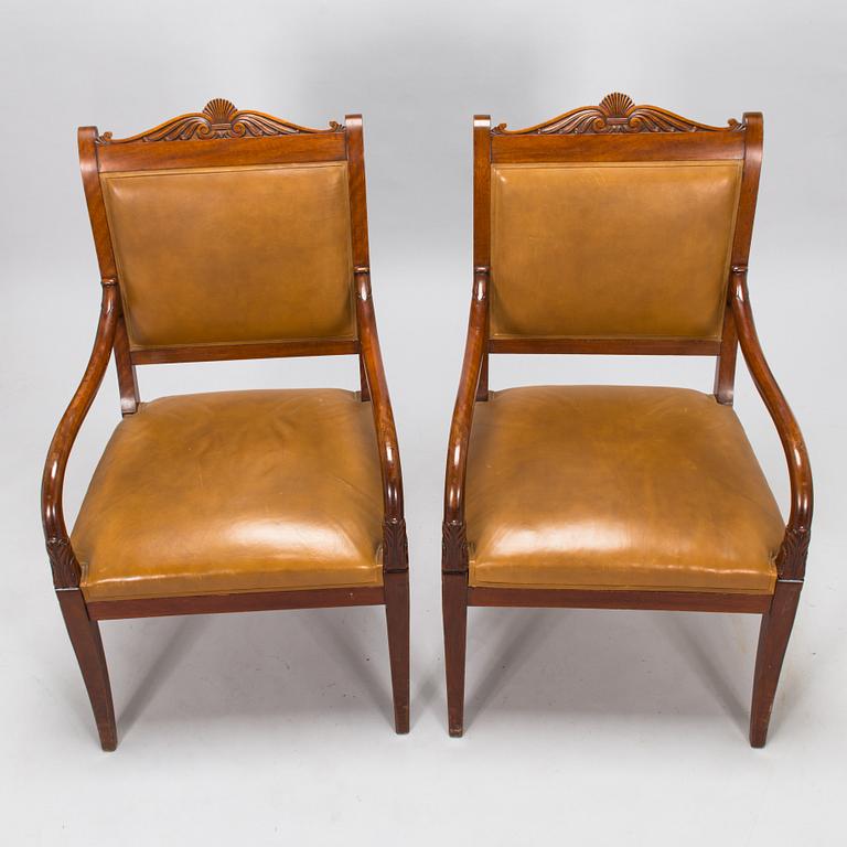 A pair of armchairs, possibly Boman, around 1900.