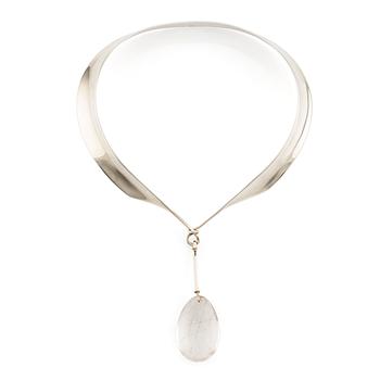 521. Vivianna Torun Bülow-Hübe, a neck ring no. 160 with pendant no. 131 in rutilated quartz, sterling silver, for Georg Jensen, Denmark.