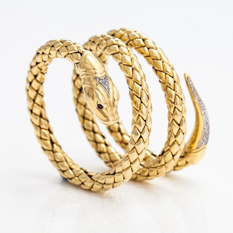 Chimento, An 18K gold snake bracelet with rubies and diamonds ca. 0.46 t in total. Italy.