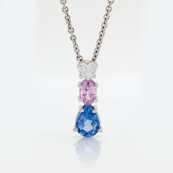 872. A PENDANT set with sapphires and a heart brilliant-cut diamond.