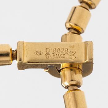 Piaget, An 18K gold "Possession" necklace with diamonds ca. 0.17 ct in total. Marked Piaget D18828.