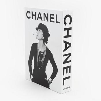 Chanel, four coffee table books.