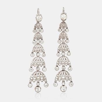 1172. A pair of chandelier diamond earrings. Old- and rose-cut diamonds, total carat weight circa 7.50 cts.