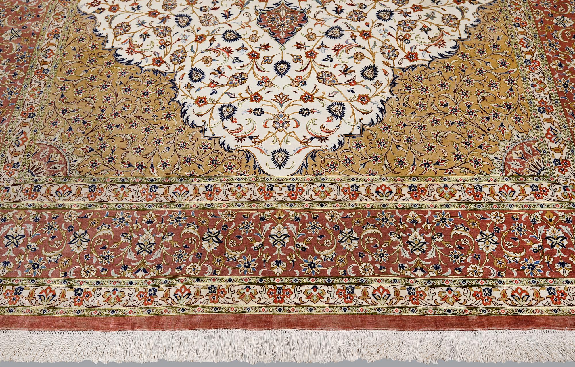 A silk Qum carpet, ca 295 x 195 cm.