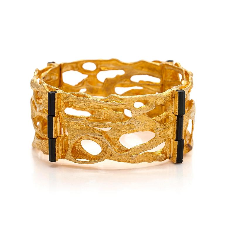 Björn Weckström, an 18K gold and tourmaline 'Sacrificial fire' bracelet. Lapponia 1971.