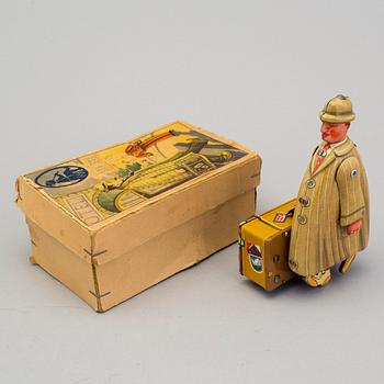 A tinplate Fritz Voith man with suitcase, Germany, 1950s.