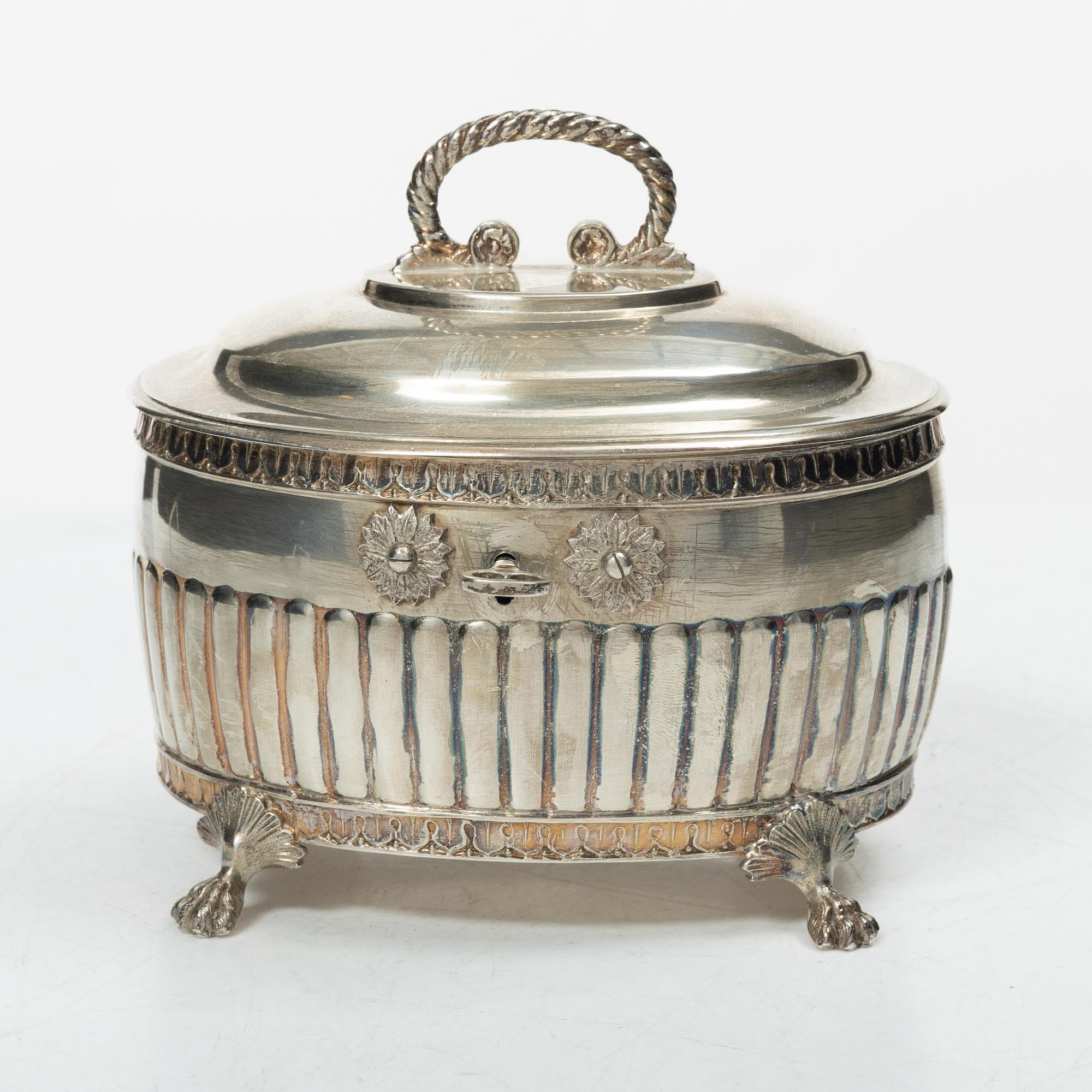 A Swedish silver coffee pot, cream jug and sugar box, Gustavian style, mark of AG Dufva, Stockholm 1911-1912.