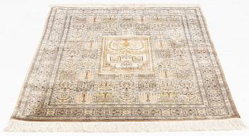 A carpet, oriental silk, circa 145 x 97 cm.