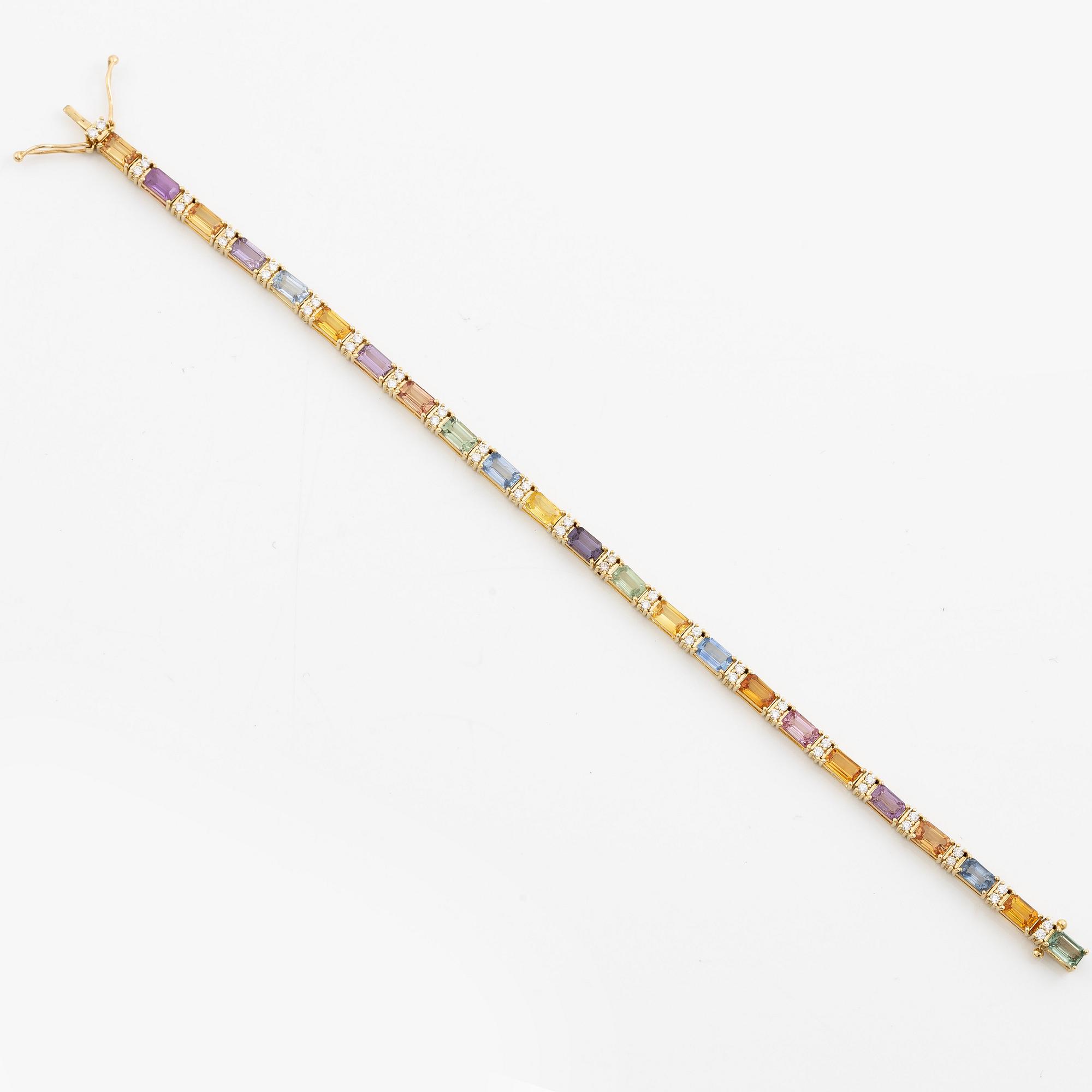 Bracelet 18K gold with multi-coloured sapphires and round brilliant-cut diamonds.