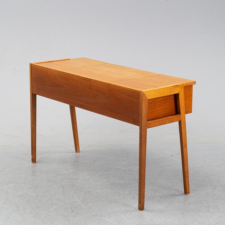 A 1960's teak dressing table.