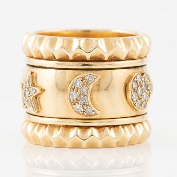 Ring in 18K gold with eight-cut diamonds, decorated with stars, hearts, and moons.