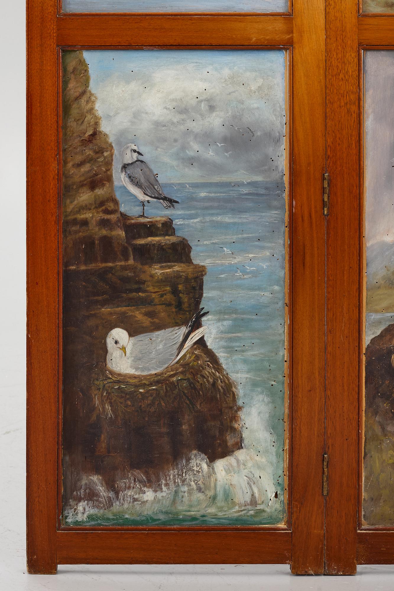 A folding screen, late 19th century.