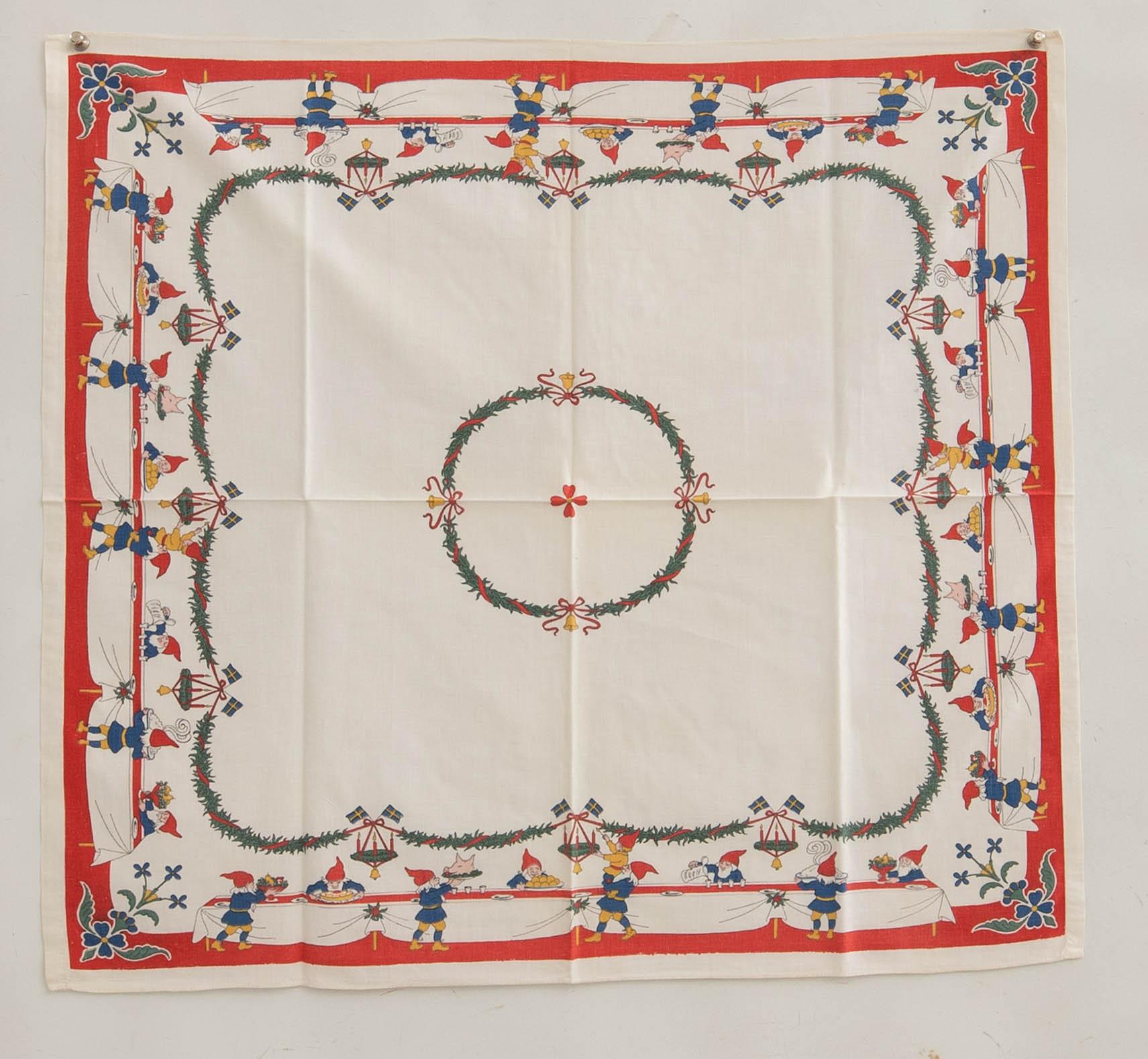 A collection of smaller Christmas tablecloths, runners, and wall hangings, approximately 34 pieces, mid/second half of the 20th century.