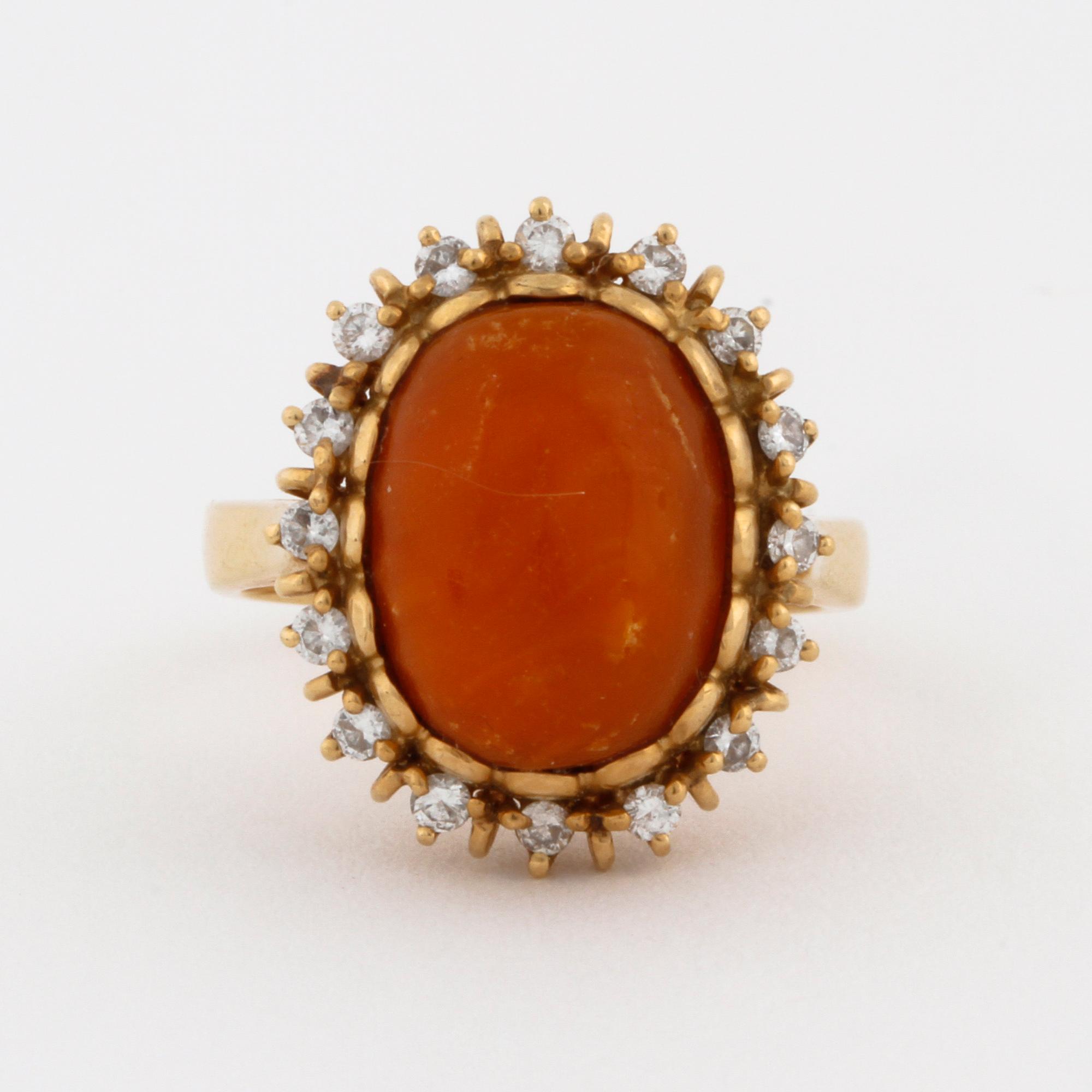 A amber and brilliant cut diamond ring by Walters guldsmedja, Stockholm, 1991.