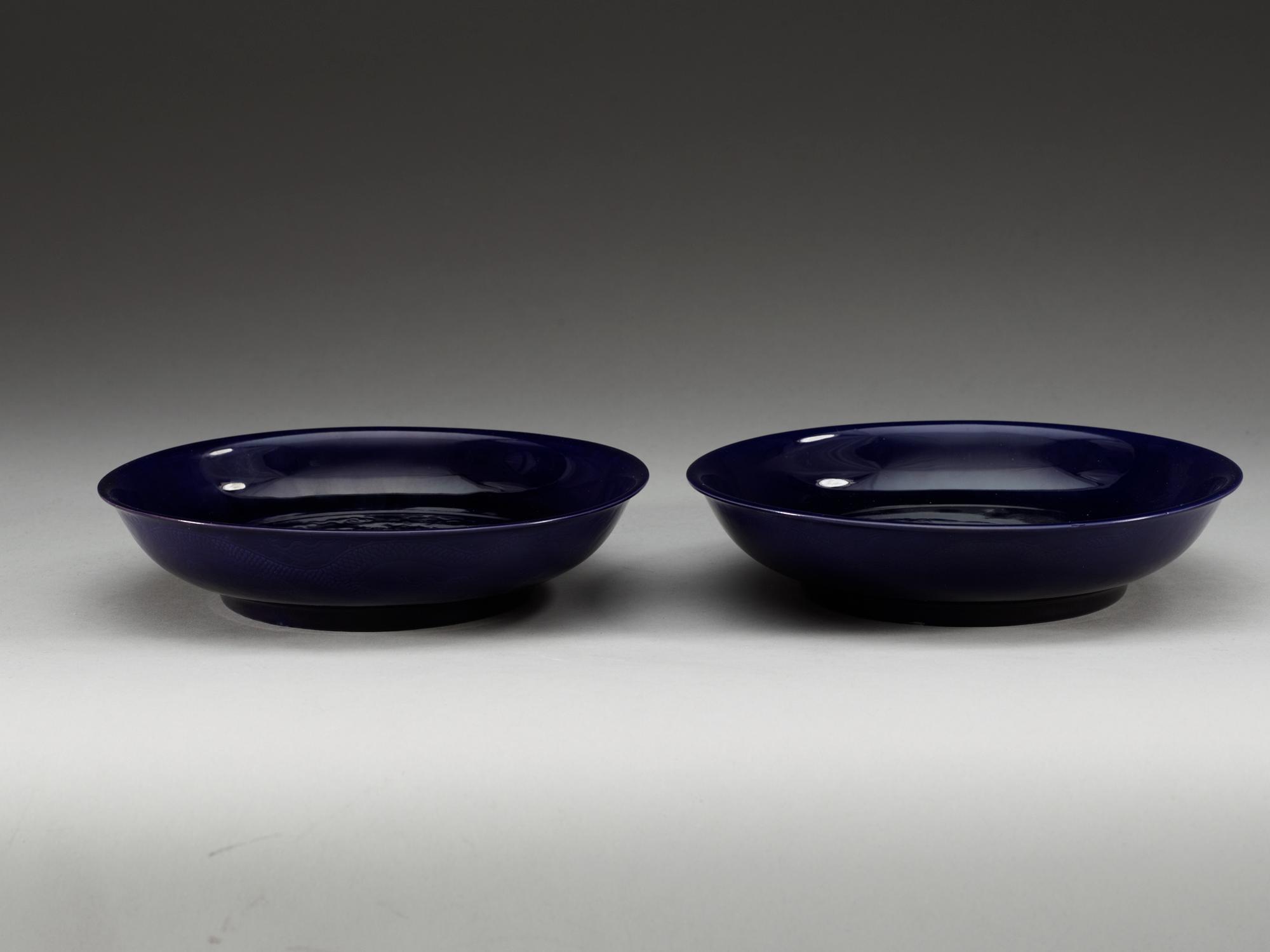A pair of deep purple glazed dishes, Qing dynasty, with Qianlong six character mark.