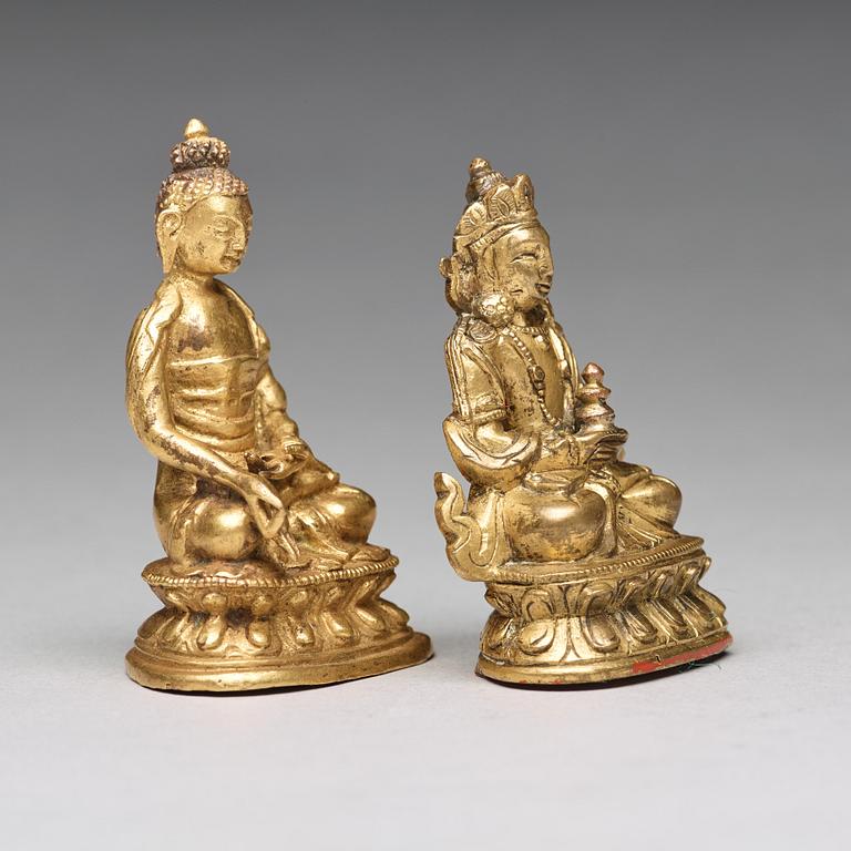 GUDOMAR, två stycken, förgylld koppar legering. Tibeto-Kinesiska, 1800-tal.