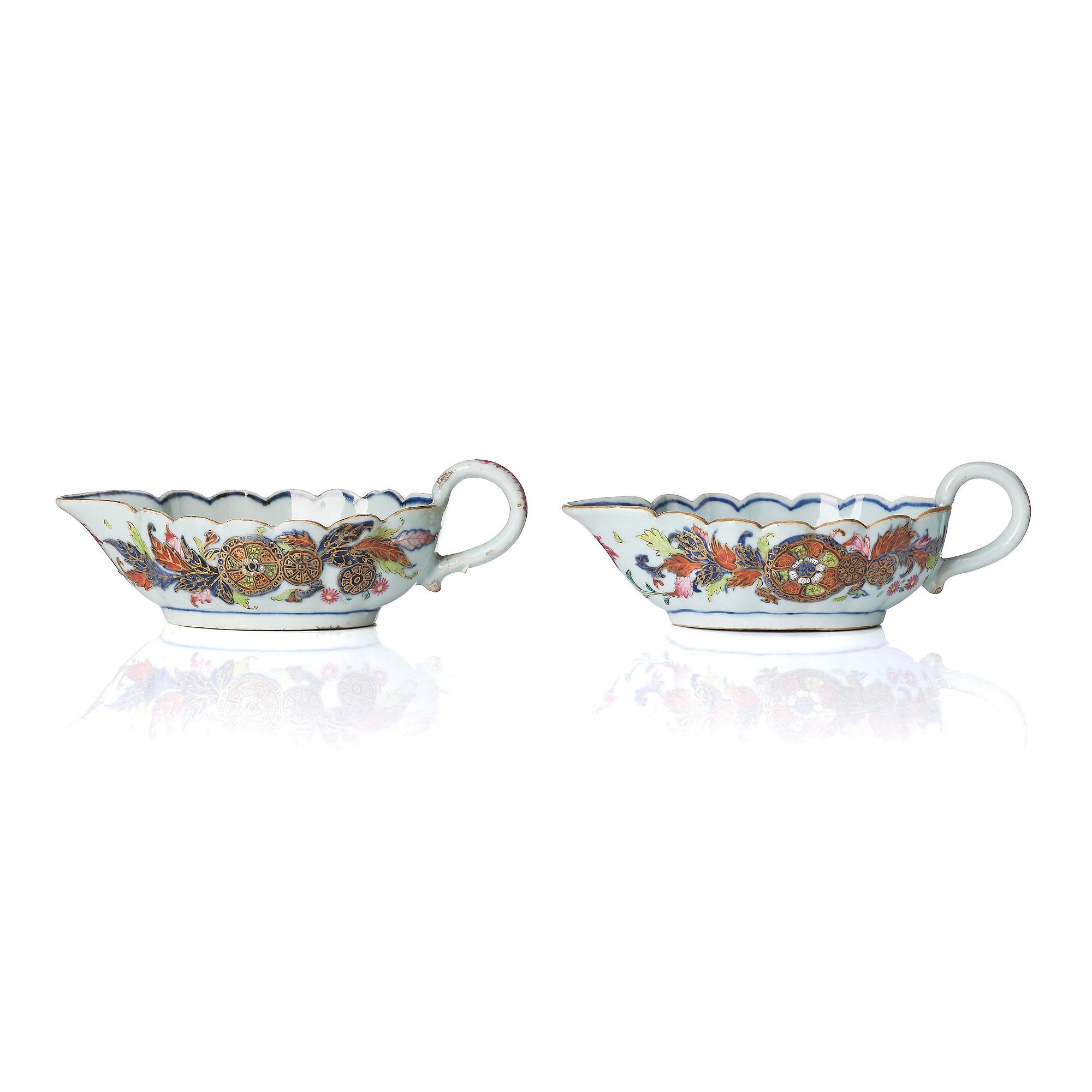 A pair of famille rose pseudo tobacco leaf sauce boats, Qing dynasty, Qianlong (1736-95).