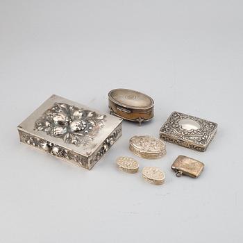 7 silver boxes.