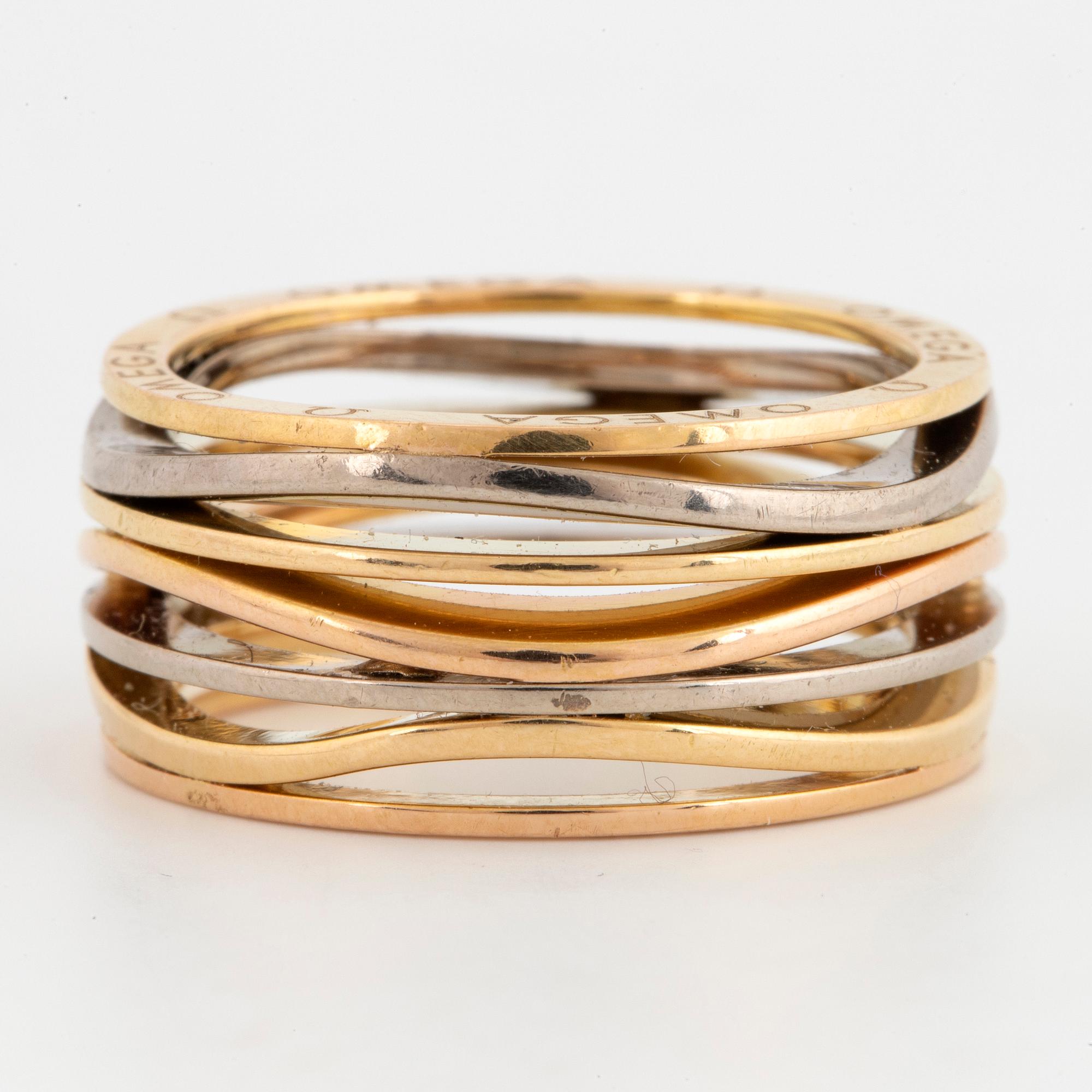 18K gold Omega ring.
