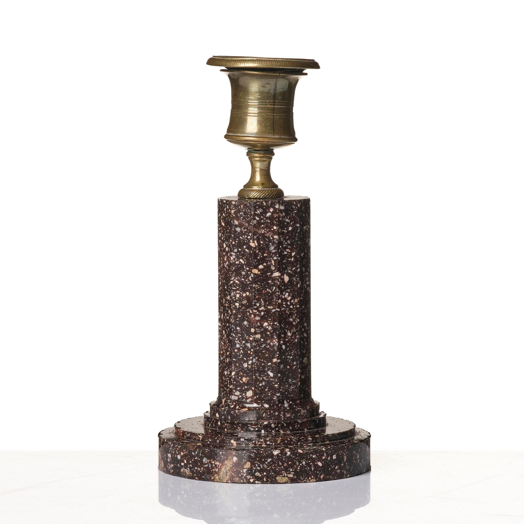 An Empire 'Blyberg' porphyry candlestick from Älvdalen, first part 19th century.