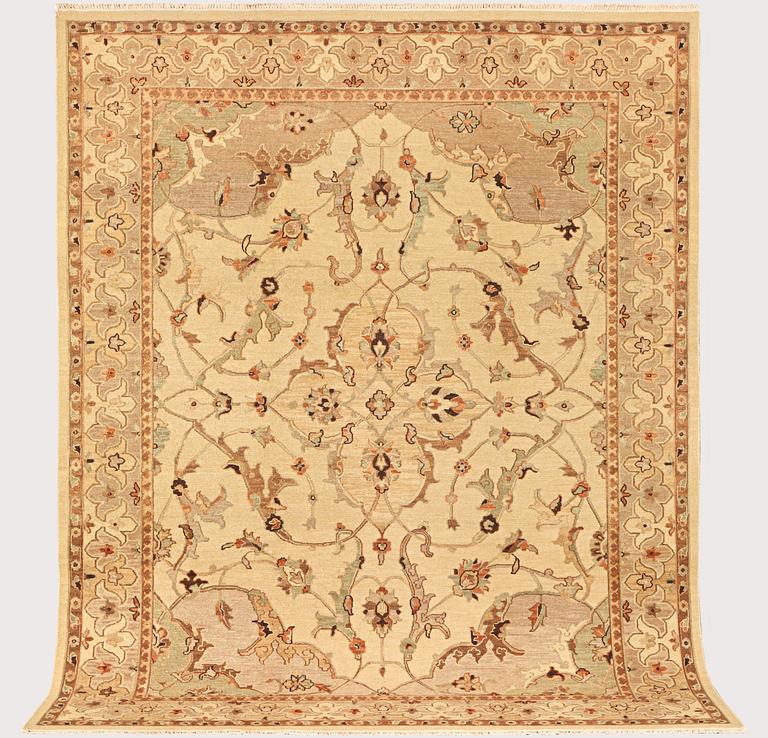 An oriental carpet with a Zeiglar pattern, c. 307 x 249 cm.