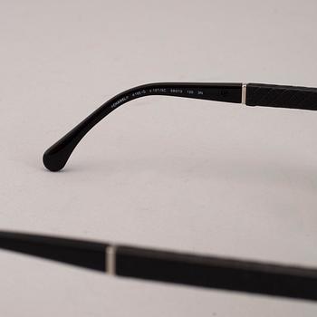 Chanel black pilot summer glasses.