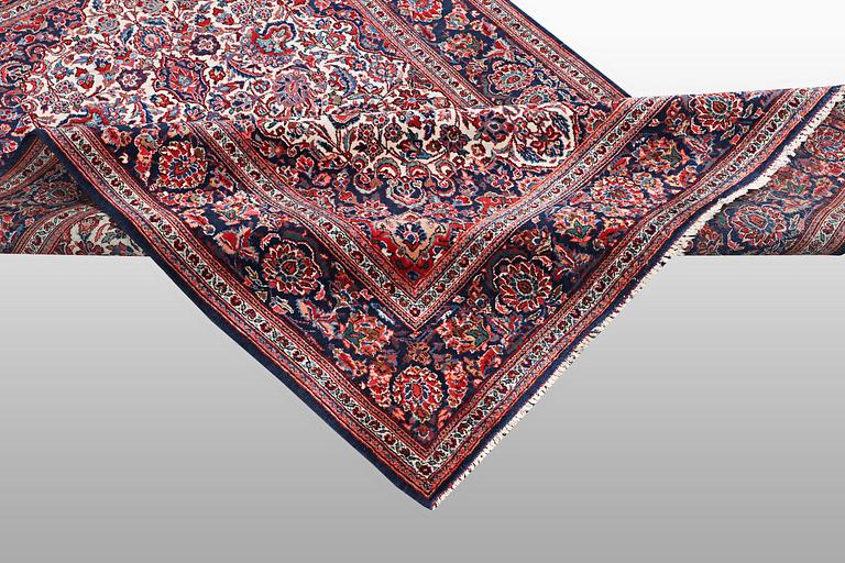 A rug, semi-antique Keshan, 217 x 134 cm.