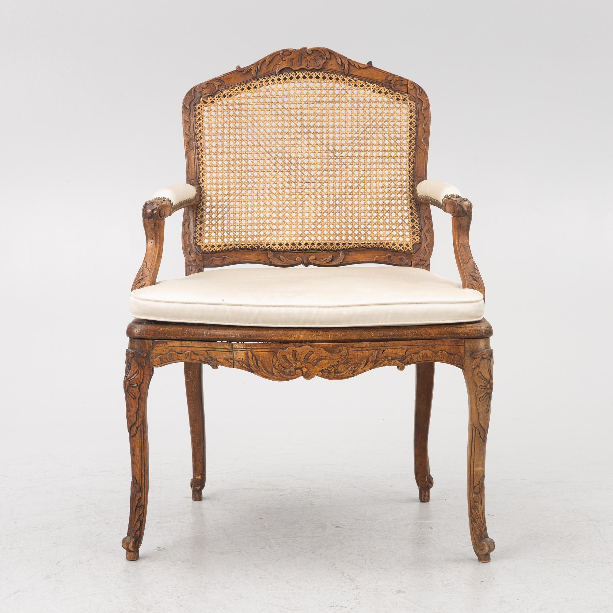 A French Louis XV armchair, mid 18th century.