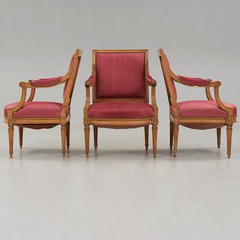 Three Louis XVI late 18th century armchairs.