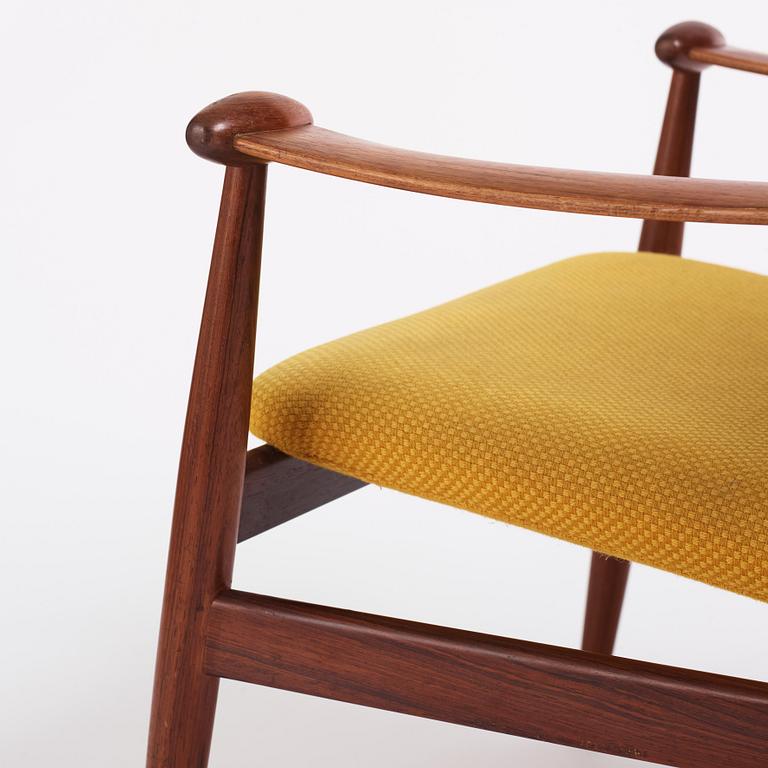 Finn Juhl, a 'model F-133' rosewood easy chair by France & Son, Denmark 1960s.