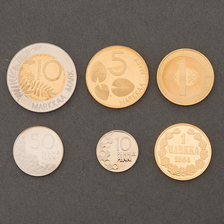 A six-piece Finnish coin collection, one in gold, 2001.
