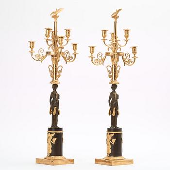 A pair of Empire early 19th century six-light candelabra.