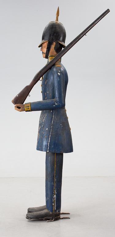 A Swedish 19th Century wooden sculpture.