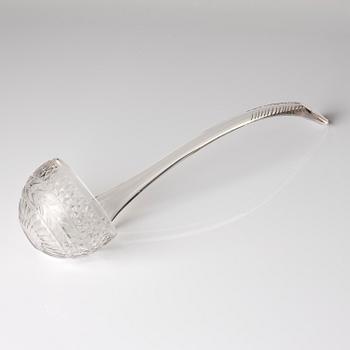 A cut glass punch bowl with cover, stand and ladle, Empire, first part of the 19th century.