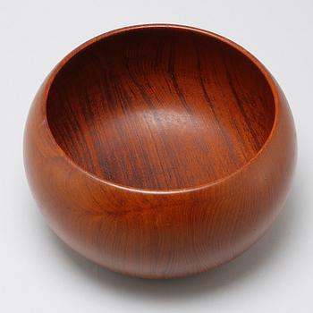 A wooden bowl, designed by Kay Bojesen.