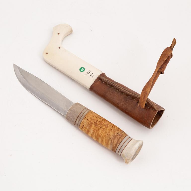 A reindeer horn knife by Johan Tuuri, signed and dated 1981.