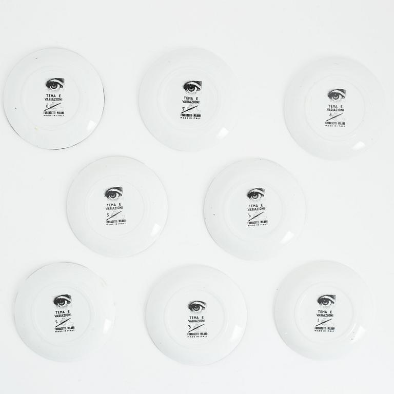 Fornasetti, coasters, 8 st, porslin, "Tema e Variazioni", Italien.