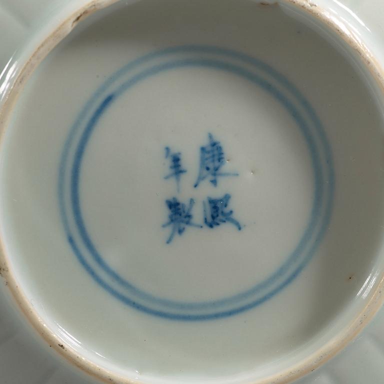 A set of six blue and white small lotus dishes, Qing dynasty with Kangxis four character mark (1662-1722).