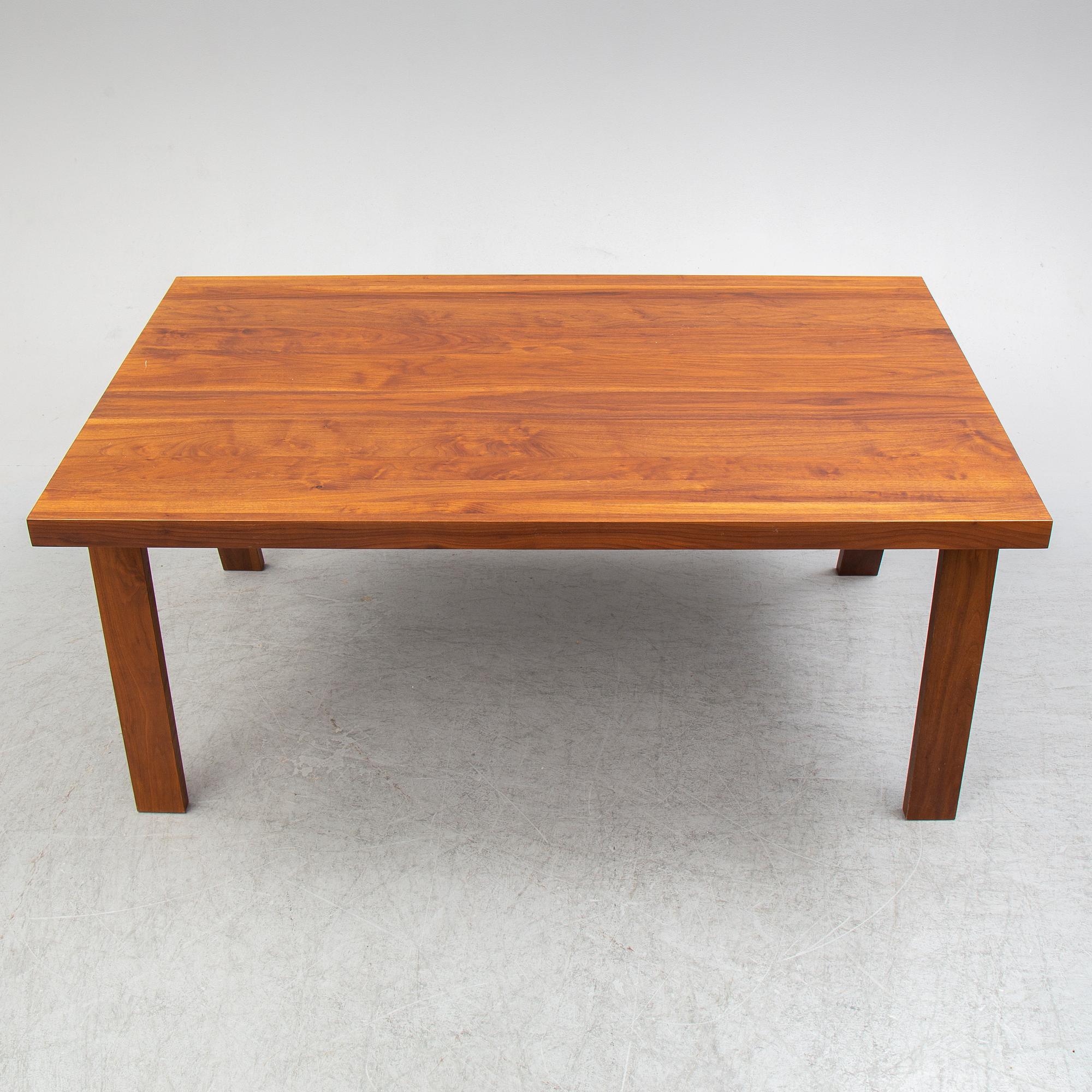 GIJS PAPAVOINE, A walnut 'Doble' dining table from Montis, The Netherlands, 2014.