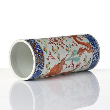 A Chinese 'dragon' porcelain brush stand, Qing dynasty, Guangxu mark and period (1875-1908).