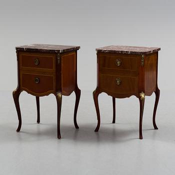 A pair of mid 20 th century mahogany bedside tables.