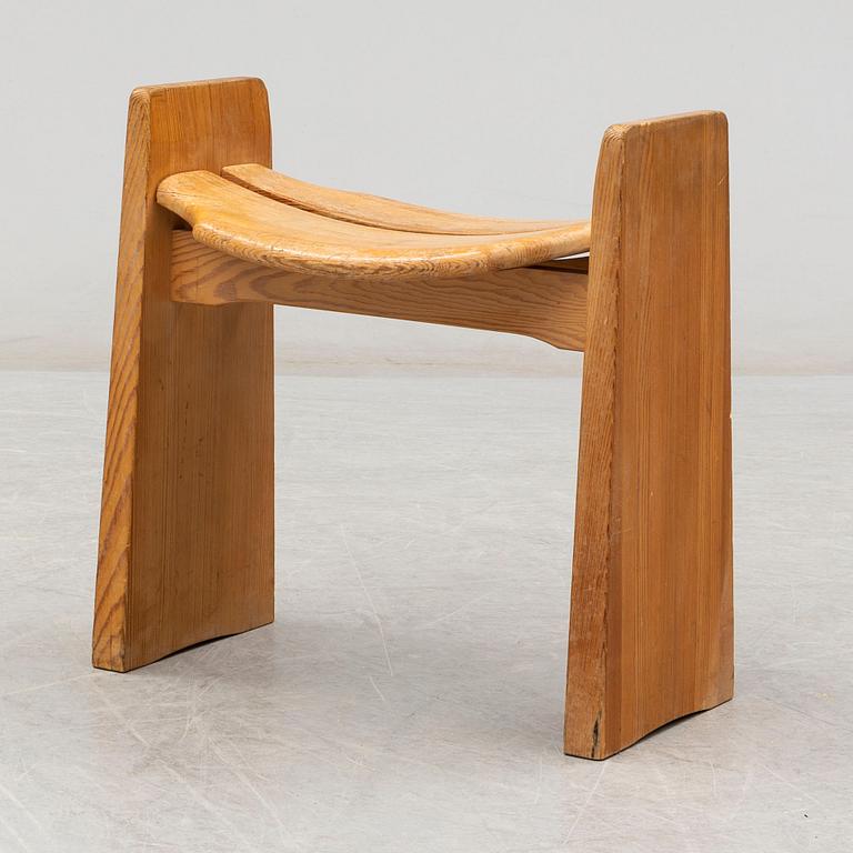 A 'Jonte' pine stool by Gilbert Marklund, designed 1969.