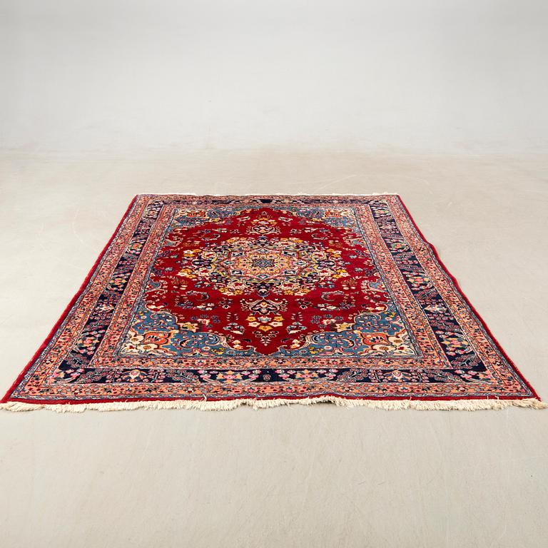 Oriental rug, old, approx. 294x190 cm.