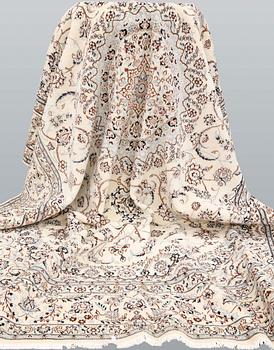 A Nain part-silk carpet, 395 x 293 cm.
